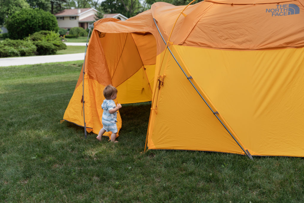 baby exploring tent family camping